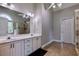 Main bathroom with double vanity and tile shower at 4167 Alayna Lee Cir, Mcdonough, GA 30252