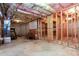 Unfinished basement with exposed wood framework and visible insulation providing a blank canvas at 240 Chandler Walk, Loganville, GA 30052