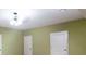 Neutral bedroom with an overhead ceiling fan and carpet flooring offers space and natural lighting at 240 Chandler Walk, Loganville, GA 30052