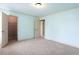 Bright bedroom with carpet flooring and white trim at 240 Chandler Walk, Loganville, GA 30052