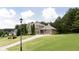 Charming home boasts impeccable landscaping, a long driveway, and a welcoming facade with ample parking at 240 Chandler Walk, Loganville, GA 30052