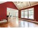 Spacious living room features hardwood floors, a fireplace, and an open floor plan at 240 Chandler Walk, Loganville, GA 30052