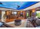 Finished basement with a wet bar, brick fireplace, theater, and carpet insert at 4239 Lower Jersey Rd, Covington, GA 30014