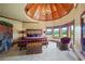 Spacious bedroom with wood ceiling, neutral walls, carpet floors, and view to the water at 4239 Lower Jersey Rd, Covington, GA 30014