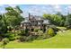 Stunning estate home with meticulously landscaped grounds and a private pool area at 4239 Lower Jersey Rd, Covington, GA 30014