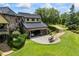 Spacious garage with parking for cars and helicopter, plus landscaped grounds at 4239 Lower Jersey Rd, Covington, GA 30014