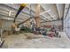 Large hangar with ample space, including a helicopter and other lawn maintenance equipment at 4239 Lower Jersey Rd, Covington, GA 30014