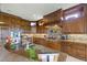 Beautiful kitchen with custom cabinets, granite countertops, and stainless steel appliances at 4239 Lower Jersey Rd, Covington, GA 30014