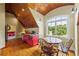 Kitchenette with wooden floors and recessed lights adjacent to round table at 4239 Lower Jersey Rd, Covington, GA 30014
