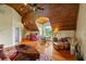 Cozy sitting area with wood ceiling and an open kitchenette at 4239 Lower Jersey Rd, Covington, GA 30014