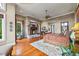 Main bedroom showcases a stone fireplace and a large bed with detailed wood trim at 4239 Lower Jersey Rd, Covington, GA 30014