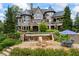 Inviting outdoor area featuring a pool, fire pit, and lush landscaping at 4239 Lower Jersey Rd, Covington, GA 30014