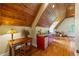Upstairs wet bar area featuring granite countertops and a small refrigerator at 4239 Lower Jersey Rd, Covington, GA 30014