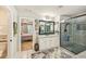 Modern bathroom featuring a glass-enclosed shower, granite countertops, and stylish fixtures at 4571 Academy St, Acworth, GA 30101