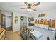 Bedroom features decorative headboard, metal frame, and closet at 4571 Academy St, Acworth, GA 30101