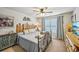 Cozy bedroom with decorative headboard, metal frame, and decorative side table at 4571 Academy St, Acworth, GA 30101