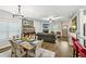 A dining area next to the living room with large windows at 4571 Academy St, Acworth, GA 30101