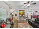 A living room, stairway, and kitchen with an open design at 4571 Academy St, Acworth, GA 30101