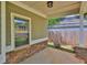 Covered patio featuring stone accents and a view of the home's backyard at 4571 Academy St, Acworth, GA 30101