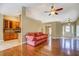 Inviting living room with hardwood floors, open floor plan, and natural light at 2321 Sunnyview Ln, Dacula, GA 30019