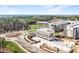 Aerial view showcases the community layout, green spaces, and the surrounding wooded area at 7230 Summit Pl, Alpharetta, GA 30009