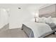 A beautifully staged bedroom featuring fresh white bedding and an abstract art piece at 12 Ivy Ne Rdg, Atlanta, GA 30342