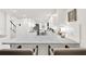 Spacious kitchen with a marble countertop and breakfast bar, perfect for casual dining at 12 Ivy Ne Rdg, Atlanta, GA 30342