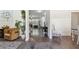 Elegant foyer showcasing hardwood floors, an ornate rug, and a view to the living spaces at 404 Arden, Ellenwood, GA 30294