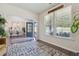 Inviting entryway boasting hardwood floors, natural light, and a seamless transition to dining room at 404 Arden, Ellenwood, GA 30294