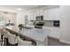 Modern kitchen featuring granite countertops, stainless steel appliances, and ample cabinet space at 404 Arden, Ellenwood, GA 30294