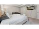 Cozy primary bedroom with mounted television and adjoining bathroom at 404 Arden, Ellenwood, GA 30294
