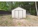 Outdoor shed offers additional storage for gardening or recreational equipment on a private lot at 404 Arden, Ellenwood, GA 30294