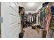 Spacious walk-in closet with ample hanging space and shelving, perfect for organizing clothes and accessories at 404 Arden, Ellenwood, GA 30294