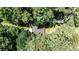 A beautiful bird's eye view of a home on a mature, private lot with a fire pit at 437 Valley Brook Ne Dr, Atlanta, GA 30342