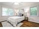 Inviting bedroom with natural light, neutral tones, and hardwood floors at 437 Valley Brook Ne Dr, Atlanta, GA 30342