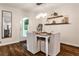 Dining room features a modern light fixture and floating shelves at 437 Valley Brook Ne Dr, Atlanta, GA 30342