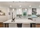 Bright kitchen with a large island, stainless steel appliances, and granite countertops at 437 Valley Brook Ne Dr, Atlanta, GA 30342