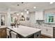 Bright kitchen with a large island, stainless steel appliances, and eat-in bar at 437 Valley Brook Ne Dr, Atlanta, GA 30342