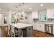 Bright kitchen featuring a large island, stainless steel appliances, and eat-in bar at 437 Valley Brook Ne Dr, Atlanta, GA 30342
