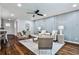 Open-concept living area with a modern kitchen, bright ambiance, and stylish furniture arrangement at 437 Valley Brook Ne Dr, Atlanta, GA 30342