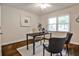 Well-lit home office with hardwood floors and comfortable seating at 437 Valley Brook Ne Dr, Atlanta, GA 30342