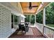 Outdoor porch featuring wood ceiling, ceiling fan, and wicker furniture at 437 Valley Brook Ne Dr, Atlanta, GA 30342