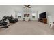 Versatile bonus room with ample space for recreation or relaxation with natural light at 4425 Martel Dr, Cumming, GA 30040