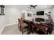 Comfortable game room featuring a bar-style table, media center, movie decor, and lounge area at 4425 Martel Dr, Cumming, GA 30040