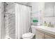 This bathroom features a shower, toilet, and vanity with a modern faucet and ample storage at 2085 Castle Royale Dr, Lawrenceville, GA 30043