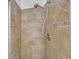 A detailed shot of the bathroom shower and shower head at 2865 Lenox Ne Rd # 103, Atlanta, GA 30324