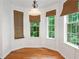 Cozy breakfast nook with windows and views of the backyard at 3372 English Oaks Nw Dr, Kennesaw, GA 30144