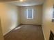 Bedroom with carpet and one window at 5040 Brittany Dr, Stone Mountain, GA 30083