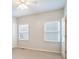 Bedroom featuring two windows and a closet at 5059 Winding Hills Lane Ln, Woodstock, GA 30189