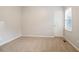 Bedroom featuring two windows and a closet at 5059 Winding Hills Lane Ln, Woodstock, GA 30189